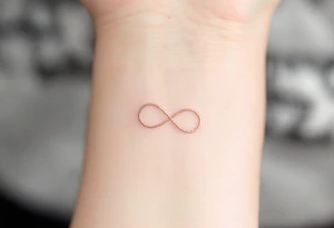 Three infinity symbols in gold, silver, and rose gold, each person (three) has its own tattoo idea