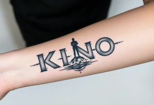 Forearm tattoo of the words kino central with graphic design of the galaxy behind it with stars in the background of the design with a man standing over top of the N in the word kino tattoo idea