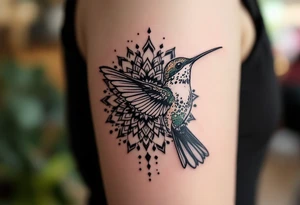 New school hummingbird centered in front of a mandala design tattoo idea