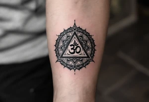 sacred geometric pattern 
 with Om in the middle tattoo idea