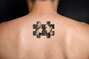 Two puzzle pieces that would only fit together with only the two to make one for two lovers tattoo idea