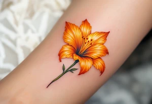 Orange glowing lily tattoo idea