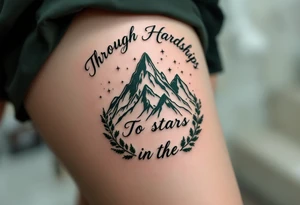 Etched in deep forest green, “Through Hardships To the stars” curls around a mountain silhouette rising into a starlit sky. tattoo idea