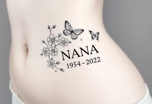 flowers and butterflies with the name “NANA” and the date “1954-2022” mixed all together on the side of the rib cage tattoo idea