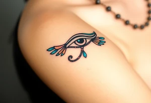 A traditional Egyptian-style Eye of Horus, adorned with turquoise and lapis lazuli details, reflecting the sacred colors of Egypt tattoo idea