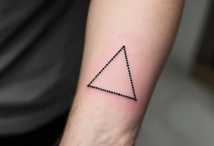 A dotted-line triangle in fine black ink, symbolizing subtlety and intention. tattoo idea