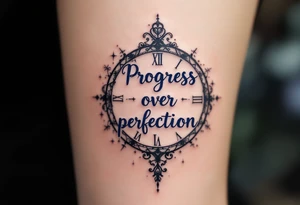 “Progress over perfection” in midnight blue, layered over a faded clock design in light gray. tattoo idea
