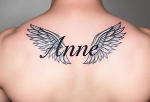 the name Anne in a phoenix feather tattoo idea