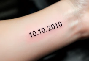 Minimalist 10.10.2010 in thin black sans serif with a small sky-blue dot between each number. tattoo idea