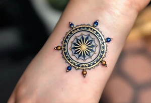 Golden Dharma Wheel with eight spokes in deep gold and royal blue, symbolizing the Noble Eightfold Path. tattoo idea