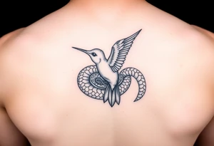 Humming bird nesting in coiled snake tattoo idea