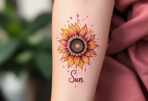 Word "Sun" written vertical with sunflower in pink tattoo idea