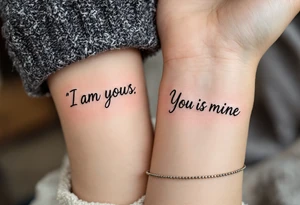 “I am yours” in soft gray on her wrist and “You are mine” in black on his neck symbolize mutual belonging. tattoo idea