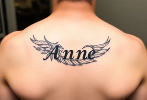 the name Anne in a phoenix feather tattoo idea