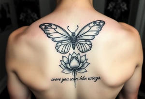 Spine tattoo that has a butterfly with cracked wings and lotus flower with quote that says she wore her scars like wings tattoo idea