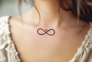 A simple gray infinity outline encircling a small rose-gold heart. tattoo idea