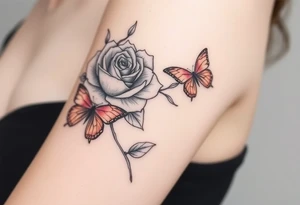 Rose and daffodil with 2 red butterflies one larger than other tattoo idea
