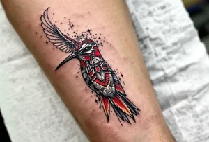 A hummingbird with one side appearing normal and the other side carved in Egyptian stone (red and black only) tattoo idea