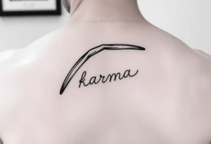 Minimalist style tattoo of a boomerang with the word karma on it tattoo idea