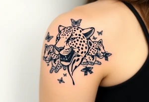 head of 3 jaguars (1 mother and 2 cubs) surrounded by butterflies and hummingbirds in new old school style tattoo idea