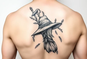 Which is broom with a witches hat with vines and feathers for women? tattoo idea