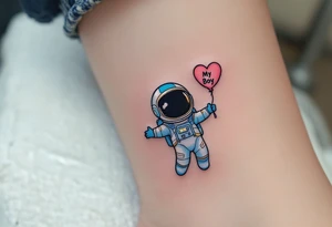 A cheeky little astronaut in a blue and silver suit, floating with a balloon shaped like a heart labeled “My Boy.” tattoo idea