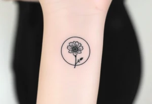 Small black and white tattoo full moon with small chrysanthemum birth flower AND tiny scorpio gliph inside moon tattoo idea