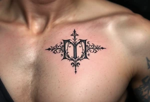 A medieval "M" in steel gray with engraved ornamental flourishes. tattoo idea
