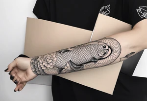 arm sleeve tattoo based around fish and snakes tattoo idea