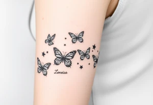 Six different butterflies streaming down arm with six kids names Aden, Aninna, Novaih, Rayla, Jayla, Teresa tattoo idea