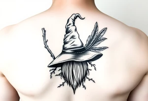 Which is broom with a witches hat with vines and feathers on your leg 
Smaller broom with hat placed on top or in the middle tattoo idea