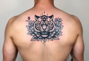 fierce tiger emerging through blooming lotus flowers in mist tattoo idea