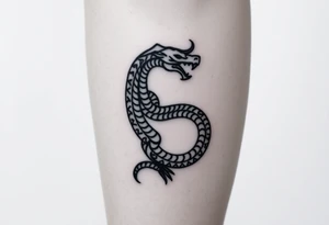 Ouroborous or dragon/serpent/snake eating its own tail in a figure 8 in negative space with geometric patterns on a leg tattoo design tattoo idea