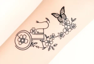A small feminine tractor with flowers and butterfly tattoo idea