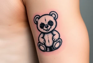 minimalist teddy bear with vinyl records as eyes smiling and sitting on a record tattoo idea