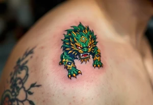 A shishi (lion dog guardian) in bold green and gold crouched protectively with a snarl. tattoo idea