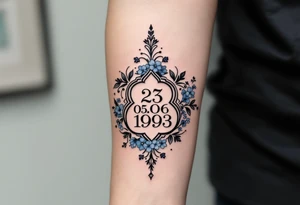 Subtle date 23.03.1993 in fine black linework, wrapped in pastel blue forget-me-nots. tattoo idea