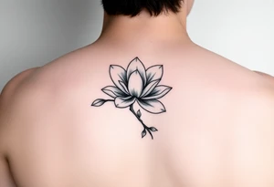 Long magnolia branch with botanical details tattoo idea