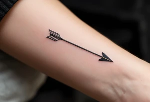 A sleek black ink arrow with a delicate gold accent running along its shaft, symbolizing elegance and direction. tattoo idea