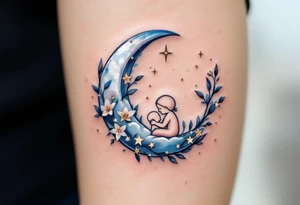 A crescent moon in silver with a mother and child nestled inside, surrounded by tiny gold stars, represents nighttime care and dreams. tattoo idea