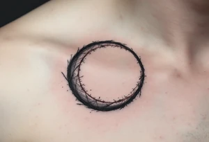 A faint gray circle with a red thread looping around its perimeter, symbolizing destiny. tattoo idea