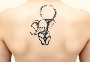 Baby elephant in  hour glass holding autism balloon tattoo idea