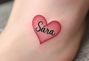A heart shaded in pinky with Sára in a handwritten-style font inside. tattoo idea