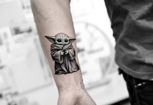 Mandolorian is holding baby yoda tattoo idea