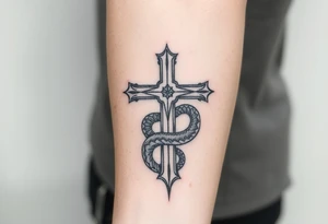 The cross impales the snake tattoo idea
