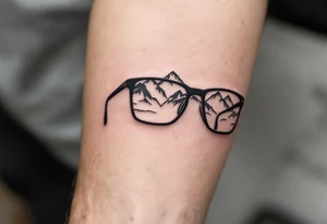 Glasses that show the world clearly
One lens can be made cloudy or cracked, and the other crystal clear, showing mountains, sky or nature. tattoo idea