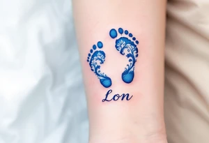 A pair of tiny blue footprints with the son's name in elegant black script beneath. tattoo idea