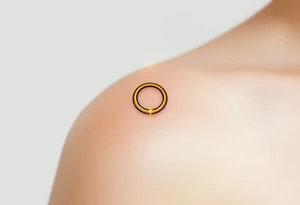 A golden wedding ring floating within an angelic halo, glowing softly. tattoo idea