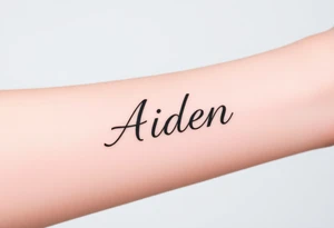 The name Aiden chunky
 and bold cursive tattoo idea