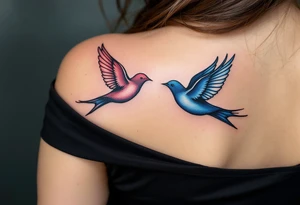 Stylized swallows in dusty rose and deep blue flying toward each other on the back shoulders signify freedom and loyalty. tattoo idea